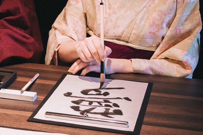 Elegant Tea Ceremony While Wearing Kimono Experience in Kyoto - Making matcha in a formal tea room