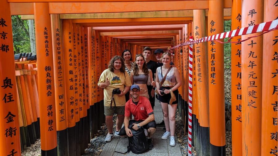Full-Day Kyoto Walking Tour: Most Iconic Landmarks & Monkeys - Starting beneath the torii at Fushimi Inari