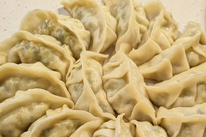 Home style Ramen and Homemade Gyoza in Kyoto - Rolling gyoza skins by hand