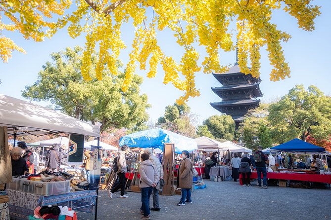 Kyoto Flea Market Cultural Exchange with English Learners - Riding to To-ji Temple with a local guide