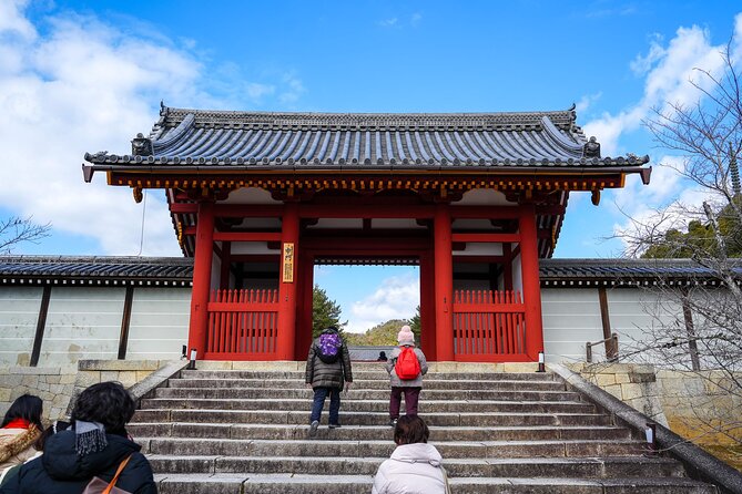 Kyoto UNESCO World Heritage Site Private Tour with a Premium Van - Fushimi Inari ends the day beneath red torii gates
