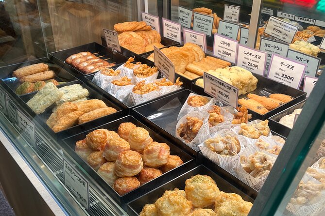 Nishiki Market Walking Food Tour With Gyoza Workshop - Walking from the market to Nishiki Tenmangu Shrine