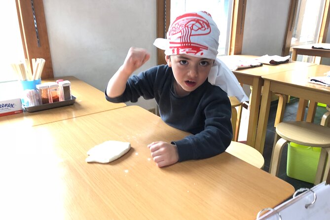 Ramen Cooking Class at Ramen Factory in Kyoto - Kneading, rolling, and pressing the ramen dough