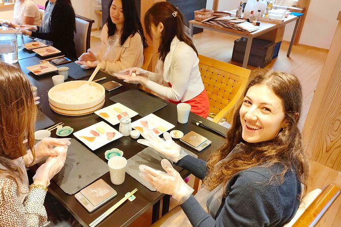 The Original Small-Group Sushi Making Class in Kyoto - Shaping nigiri with personal guidance